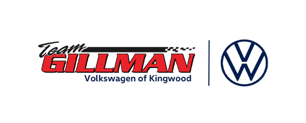 Logo for Team Gillman Volkswagen of Kingwood featuring the Volkswagen emblem.
